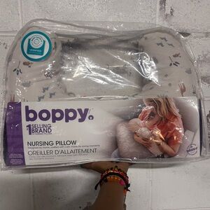 New never used Boppy nursing pillow